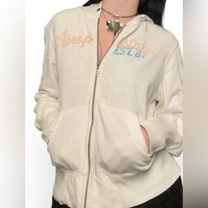 white with pink and blue lettering aeropostle jacket